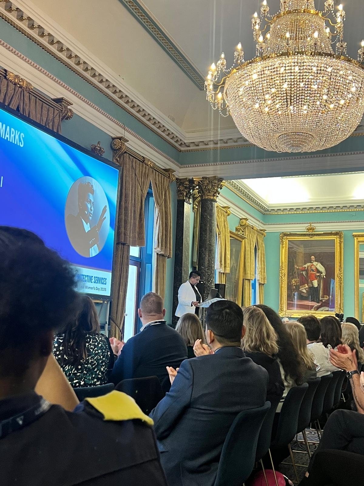 satia rai on stage at international womens day event